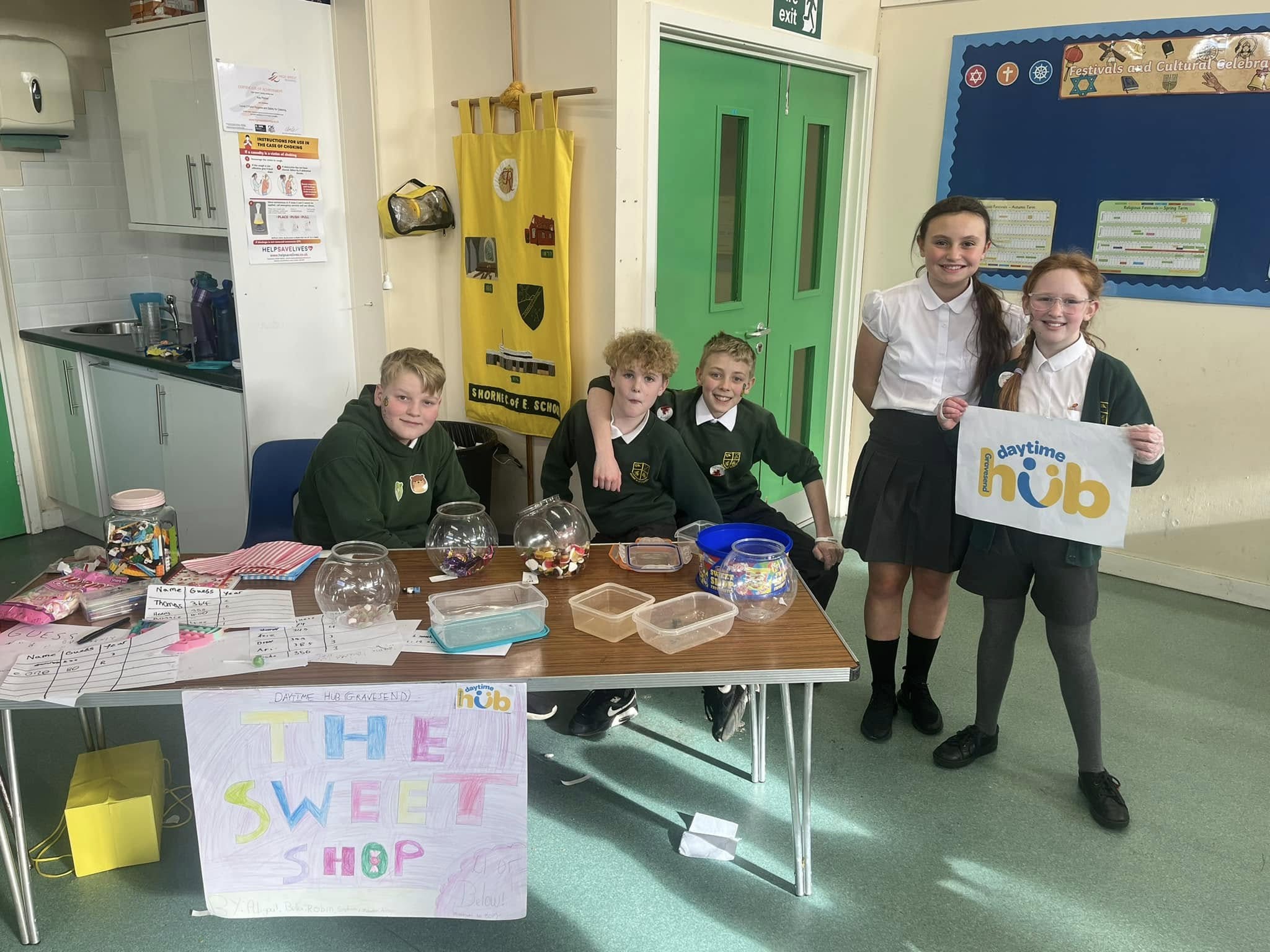 Volunteers helping children